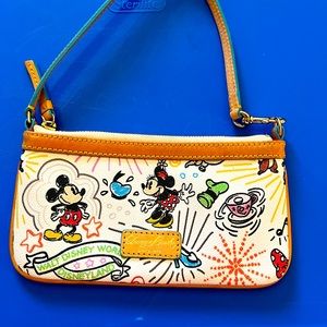 Dooney & Bourke mini purse from Disney World. Used once. Excellent condition! ❤️